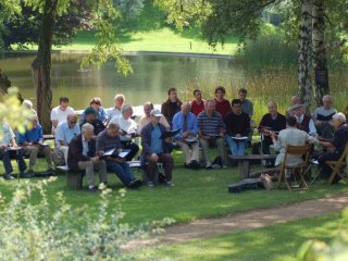 A group of men meeting at the lake on Kanaan